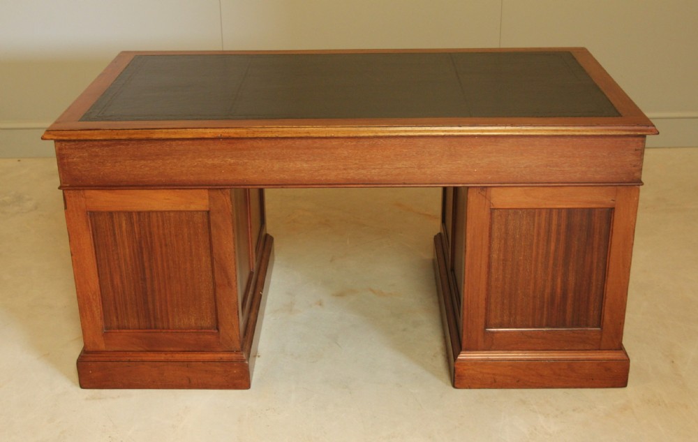 A LARGE EARLY 20TH MAHOAGANY WRITING DESK.  View IX