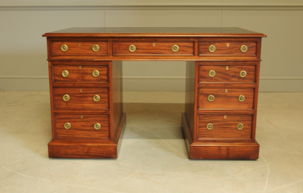 A VICTORIAN MAHOGANY WRITING DESK. View XI