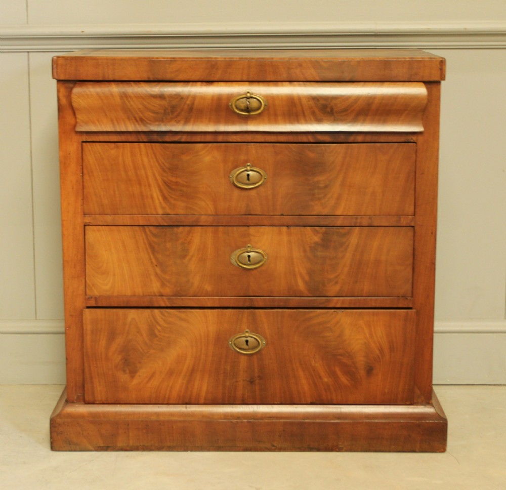 A Curl mahogany 19th-century Swedish late Empire chest of drawers. View III