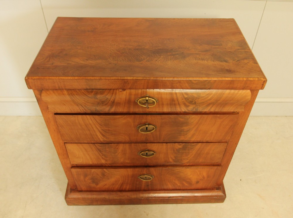 A Curl mahogany 19th-century Swedish late Empire chest of drawers. View VIII