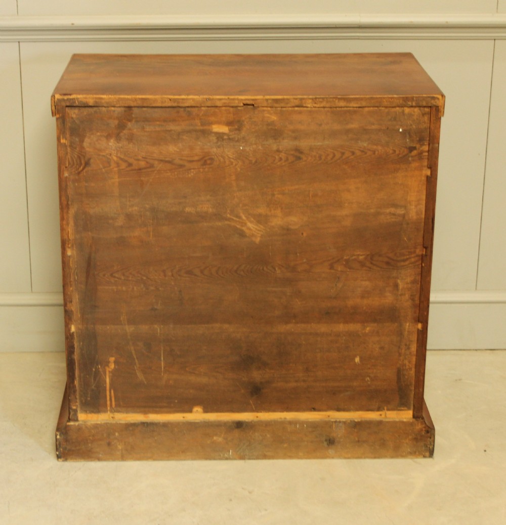A Curl mahogany 19th-century Swedish late Empire chest of drawers. View XII