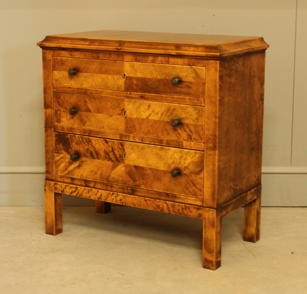 an early 20th-century Danish birch bedside chest of drawers