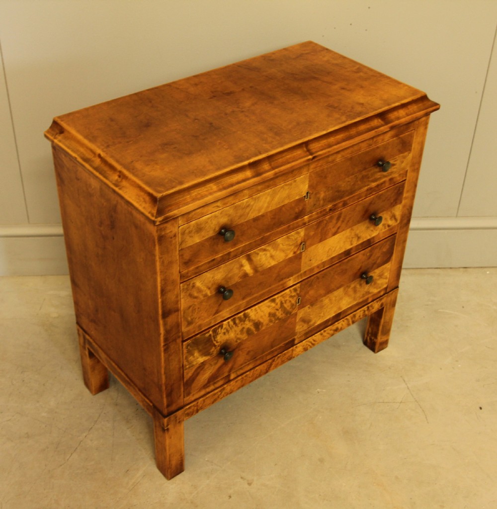 an early 20th-century Danish birch bedside chest of drawers View V