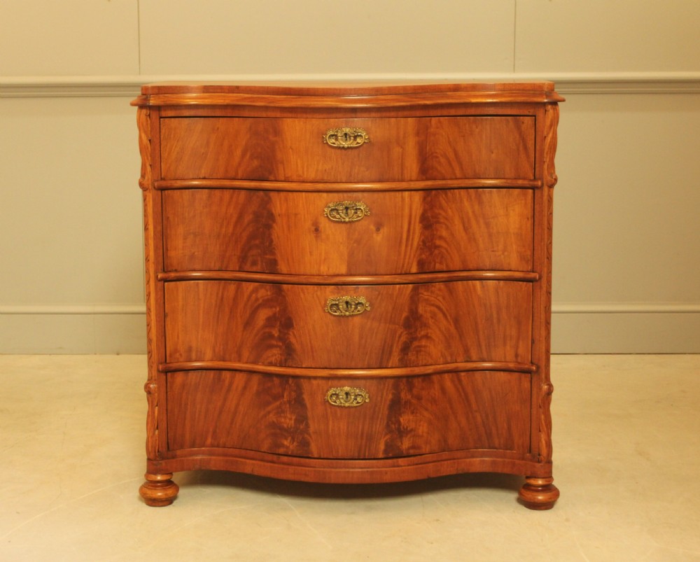 A 19th century Swedish serpentine chest of drawers.