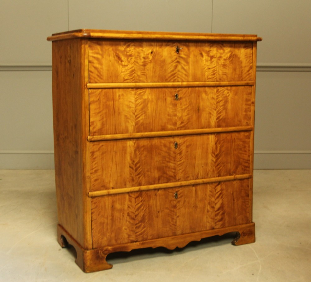 A 19TH CENTURY SWEDISH BIRCH CHEST OF DRAWERS