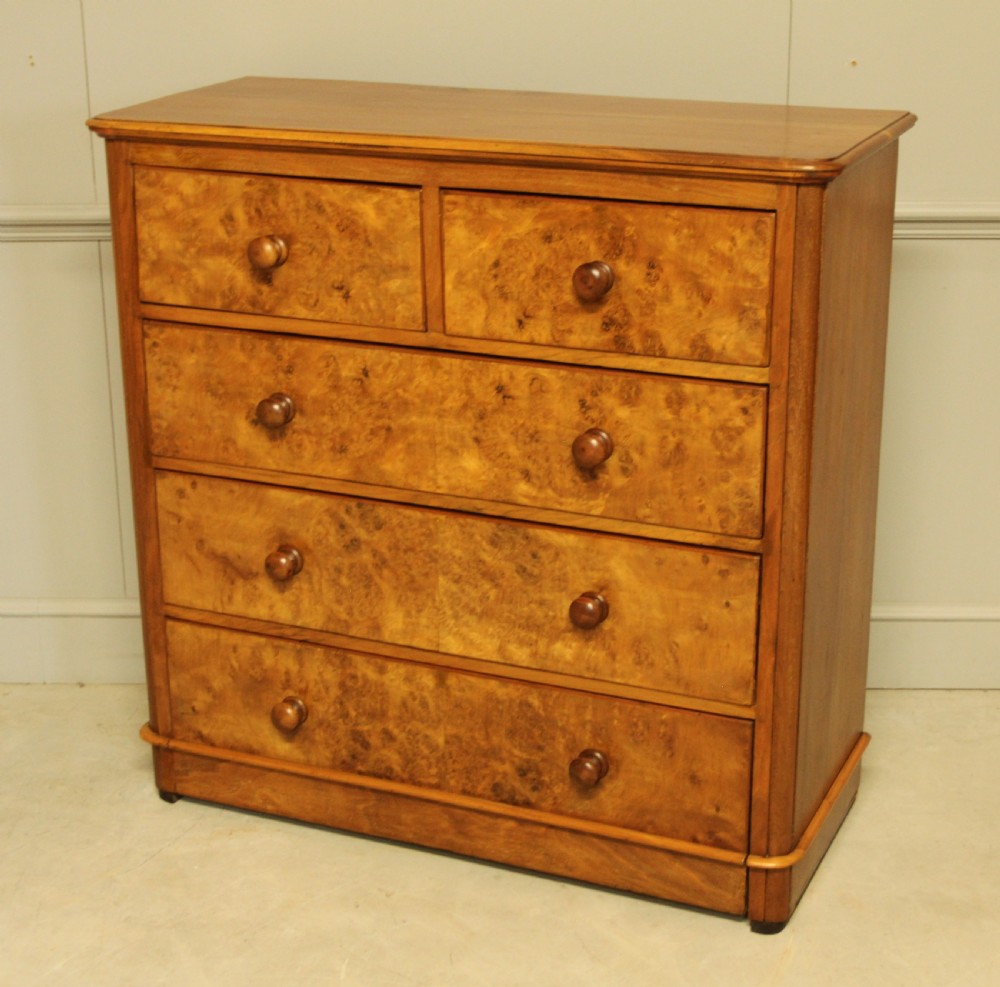 A VICTORIAN BURR WALNUT CHEST OF DRAWERS View IV