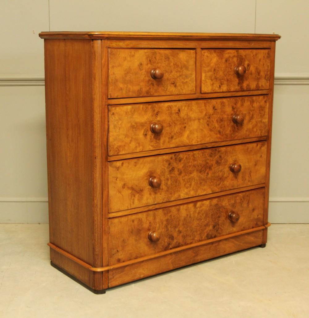 A VICTORIAN BURR WALNUT CHEST OF DRAWERS View V