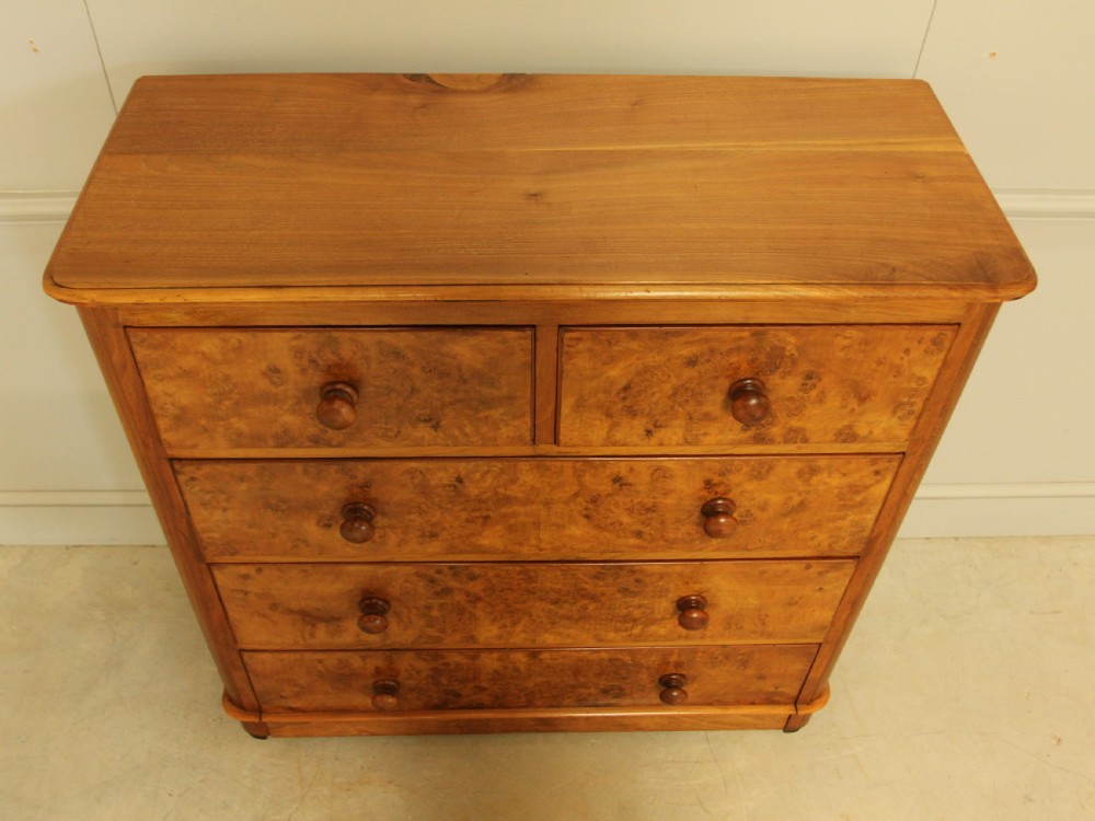 A VICTORIAN BURR WALNUT CHEST OF DRAWERS View VI
