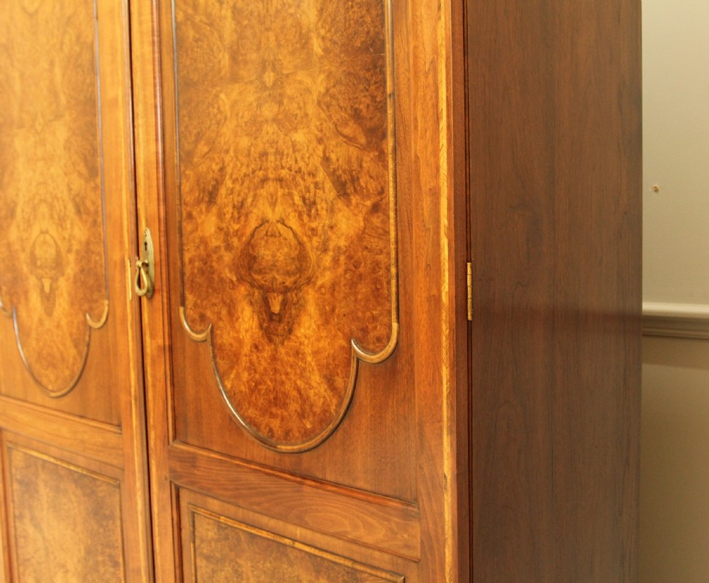 AN EARLY 20TH CENTURY BURR WALNUT TRIPLE WARDROBE View II