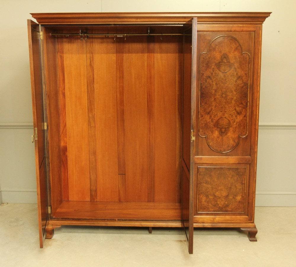 AN EARLY 20TH CENTURY BURR WALNUT TRIPLE WARDROBE View VI