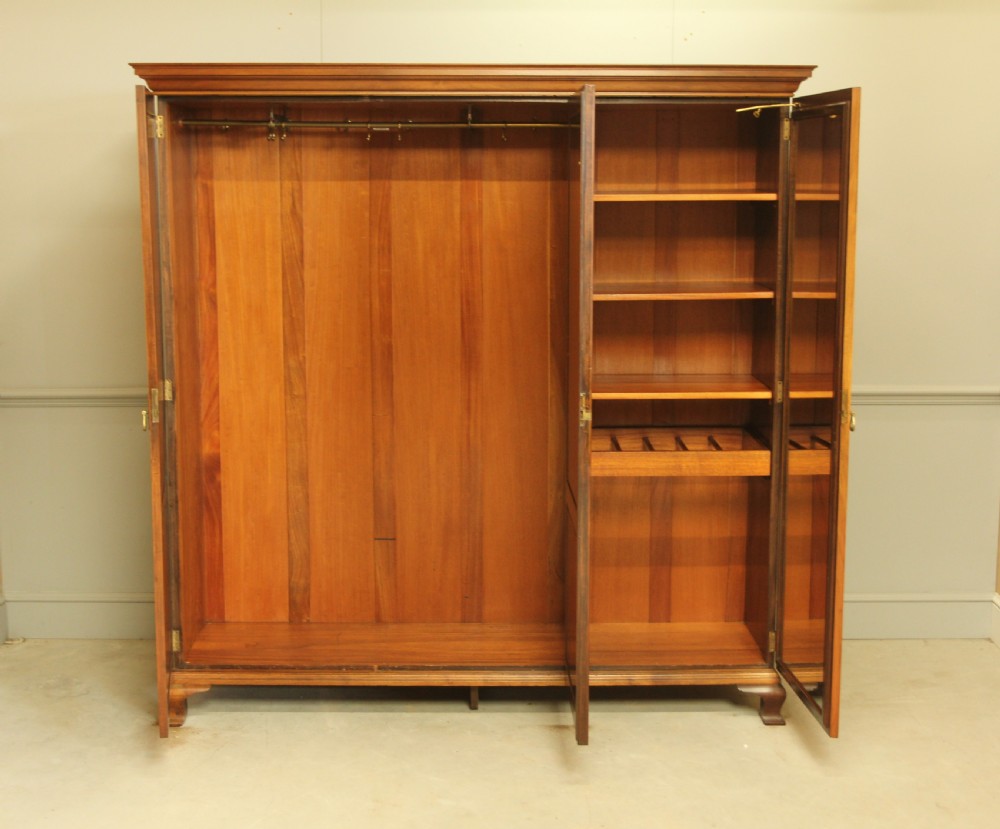 AN EARLY 20TH CENTURY BURR WALNUT TRIPLE WARDROBE View VIII