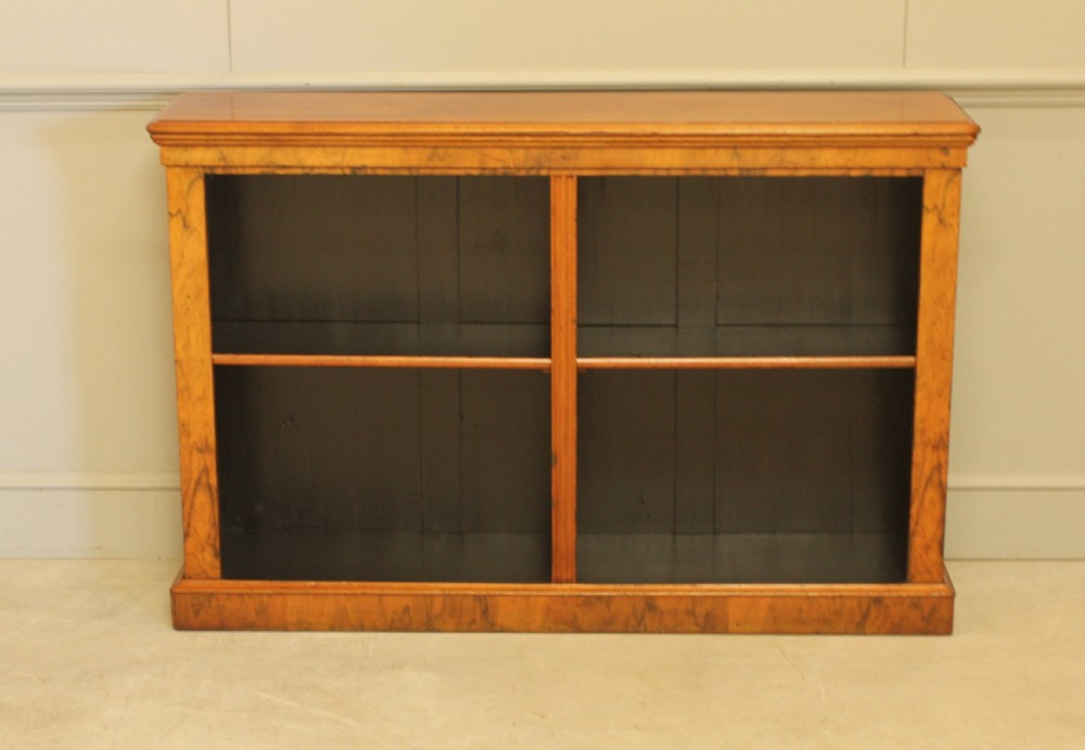 A VICTORIAN WALNUT OPEN BOOKCASE View II