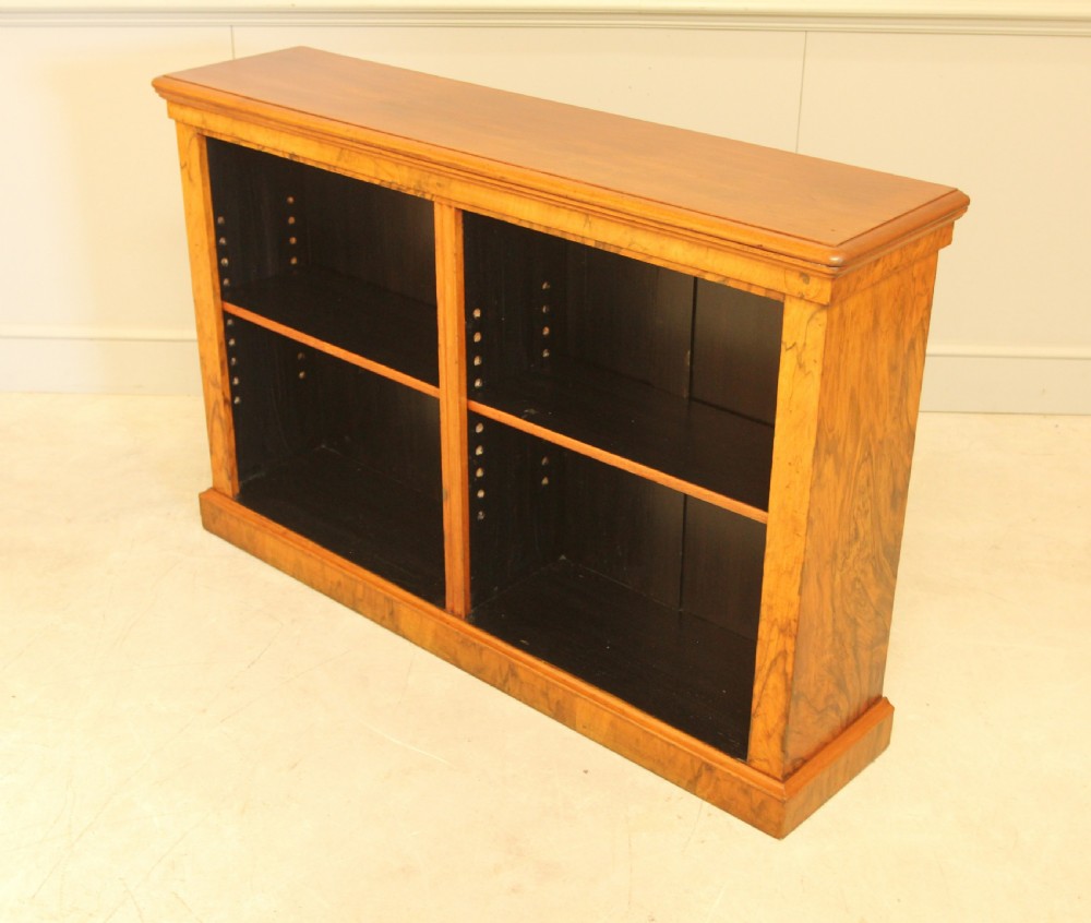 A VICTORIAN WALNUT OPEN BOOKCASE View VI