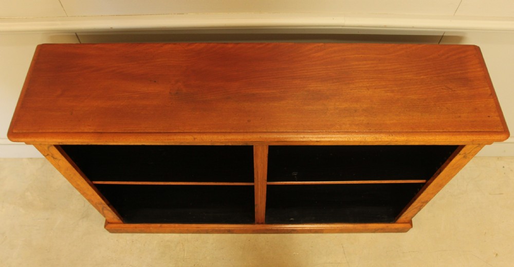 A VICTORIAN WALNUT OPEN BOOKCASE View IX