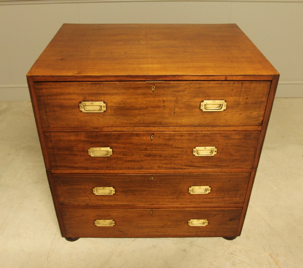 An early twentieth-century mahogany campaign chest featuring four full-width drawers with flush recessed brass handles. View III