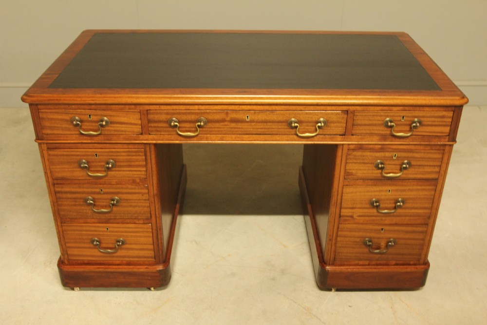An early 20th-century mahogany twin-pedestal writing desk View II