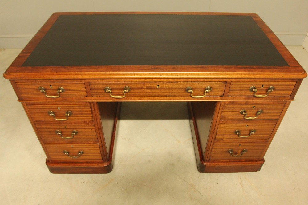 An early 20th-century mahogany twin-pedestal writing desk View III