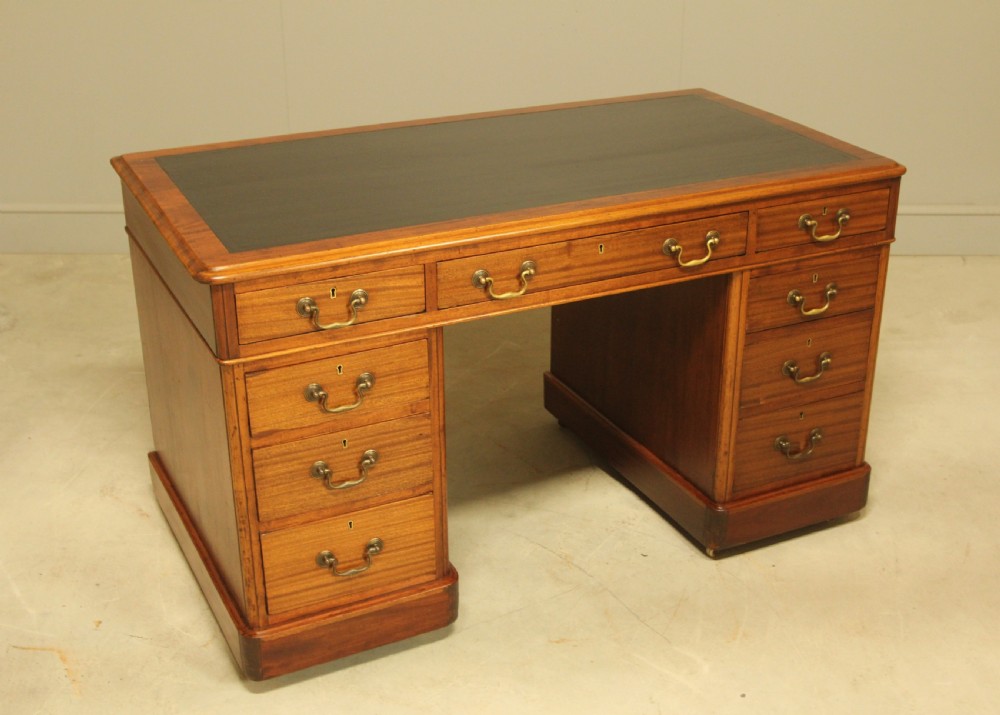 An early 20th-century mahogany twin-pedestal writing desk View IV