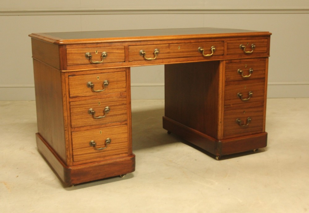 An early 20th-century mahogany twin-pedestal writing desk View V