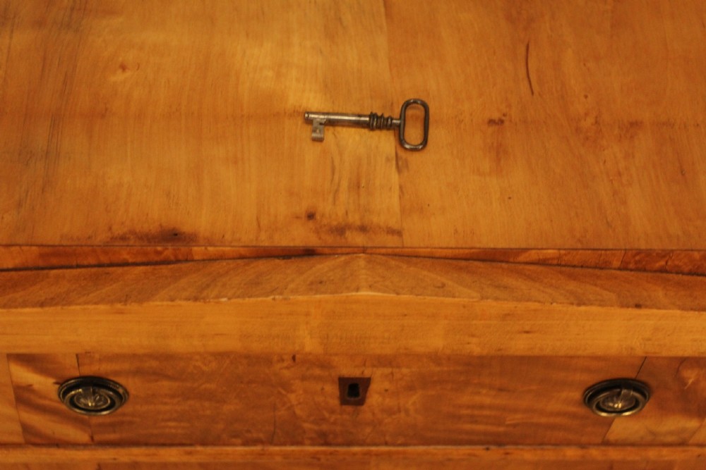 A 19th-century Swedish satin birch chest of drawers featuring three drawers with brass ring pull handles and a visible flame wood grain pattern. View IX
