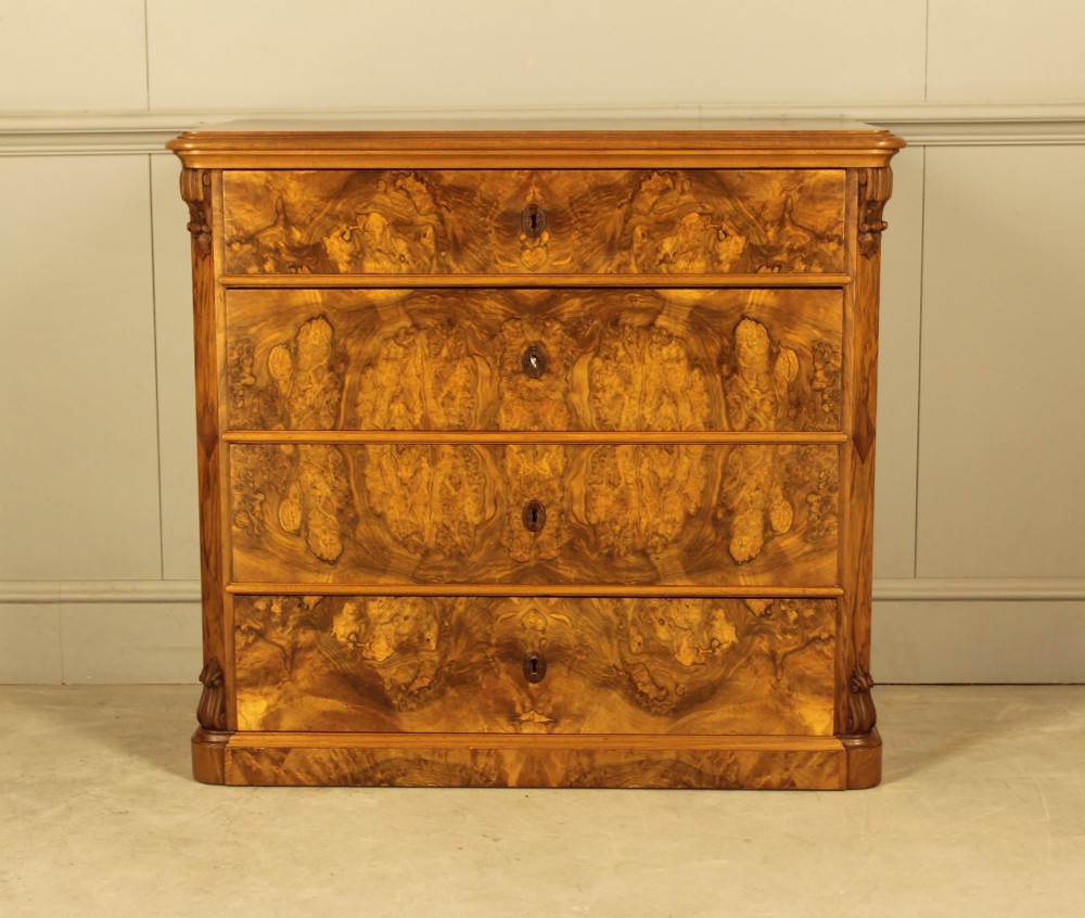 A superb 19th‑century burr walnut chest of drawers