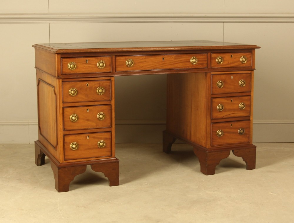 A Victorian mahogany pedestal writing desk
