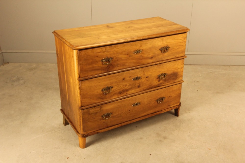 A 19th-century Swedish oak secretaire chest featuring an open hinged fall-front writing flap revealing fitted interior drawers, positioned above two large lower drawers. View VII