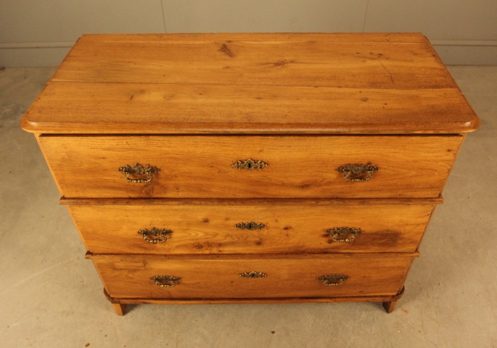 A 19th-century Swedish oak secretaire chest featuring an open hinged fall-front writing flap revealing fitted interior drawers, positioned above two large lower drawers. View IX