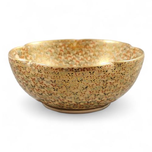 fig 1. A lobed Japanese Satsuma earthenware bowl with intricate polychrome enamel and gold gilding across the interior and exterior surface.