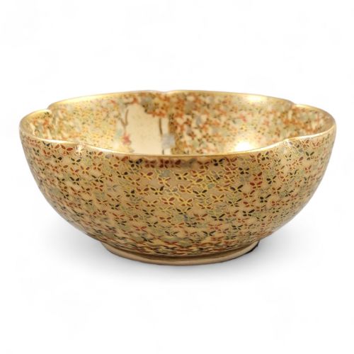 fig 2. A lobed Japanese Satsuma earthenware bowl with intricate polychrome enamel and gold gilding across the interior and exterior surface.