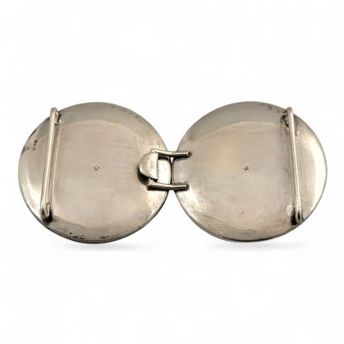 fig 3. A pair of circular Japanese Kyo-Satsuma belt buckle halves set in silver frames, decorated with intricate hand-painted birds and flowers on a cream crackle-glazed background.
