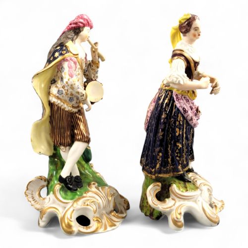 fig 4. A pair of 19th-century Bloor Derby porcelain figurines depicting a male and female musician in colourful costume on gilded rocaille bases.