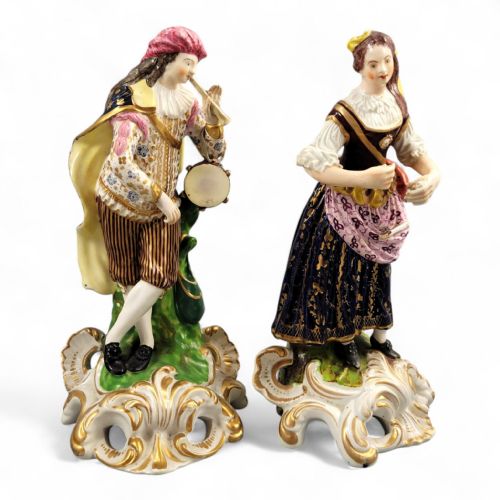 fig 5. A pair of 19th-century Bloor Derby porcelain figurines depicting a male and female musician in colourful costume on gilded rocaille bases.