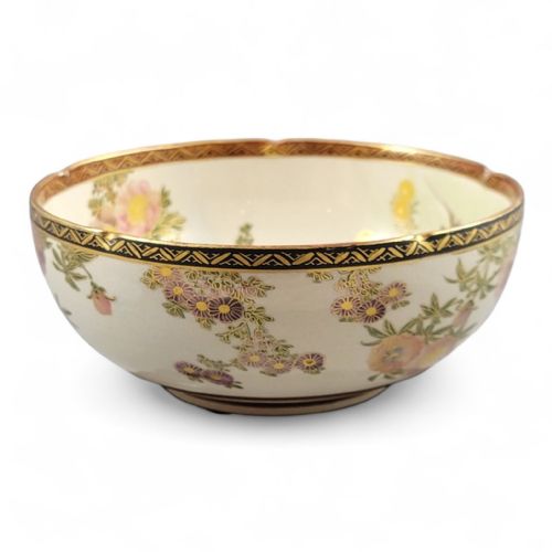 fig 2. A cream-coloured Meiji period Satsuma earthenware bowl hand-painted with floral motifs and finished with a gilded border.