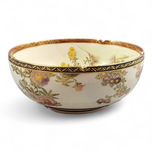fig 3. A cream-coloured Meiji period Satsuma earthenware bowl hand-painted with floral motifs and finished with a gilded border.