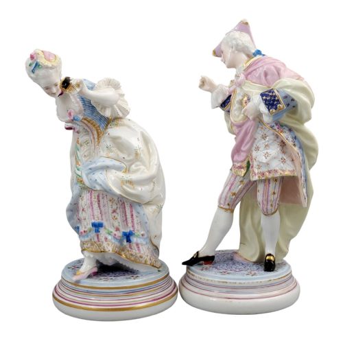 fig 2. Pair of hand-painted French Paris porcelain masquerade figures depicting a lady and gallant in pastel eighteenth-century costume on gilded circular bases.