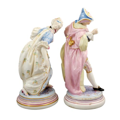 fig 3. Pair of hand-painted French Paris porcelain masquerade figures depicting a lady and gallant in pastel eighteenth-century costume on gilded circular bases.