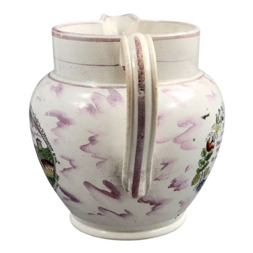 fig 1. An antique pearlware jug featuring pink splash lustre glaze details and a transfer-printed central panel depicting the River Wear cast iron bridge.