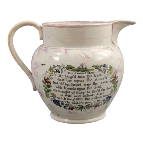 fig 2. An antique pearlware jug featuring pink splash lustre glaze details and a transfer-printed central panel depicting the River Wear cast iron bridge.