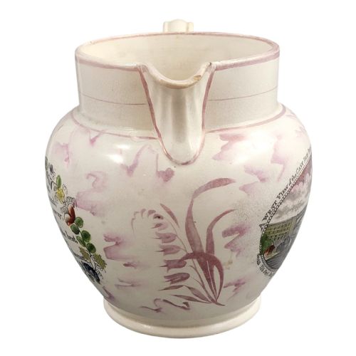 fig 3. An antique pearlware jug featuring pink splash lustre glaze details and a transfer-printed central panel depicting the River Wear cast iron bridge.