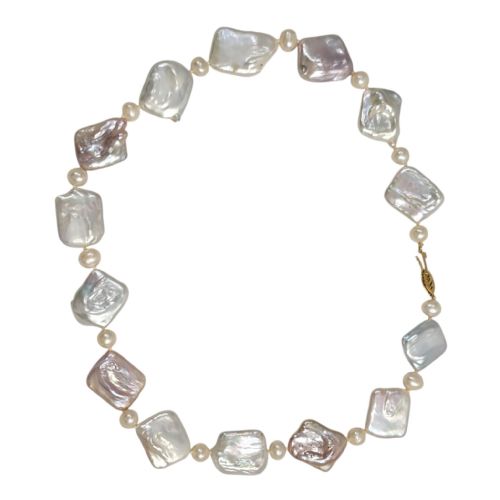 fig 2. Garrard Crown Jewellers keshi baroque pearl necklace with 18ct gold clasp