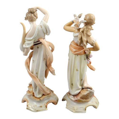 fig 4. A pair of late 18th-century Volkstedt painted porcelain allegorical figures on ornate gilded scrollwork bases.