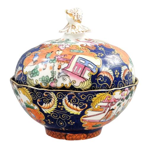 fig 3. A Regency-era Masons Patent Ironstone lidded bowl decorated with elaborate Chinoiserie motifs in cobalt blue, orange, green, and gilt detailing.