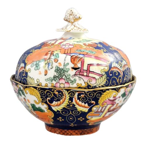 fig 5. A Regency-era Masons Patent Ironstone lidded bowl decorated with elaborate Chinoiserie motifs in cobalt blue, orange, green, and gilt detailing.