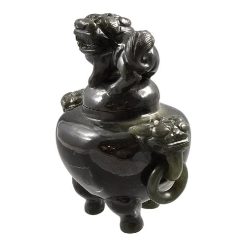 fig 2. A hand-carved dark green jade tripod censer featuring a foo dog lid finial and lion mask handles with carved loose rings.