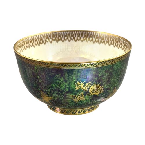 fig 3. A deep porcelain bowl featuring a mottled green iridescent exterior decorated with gilded butterflies and geometric gold borders around the rim and base.