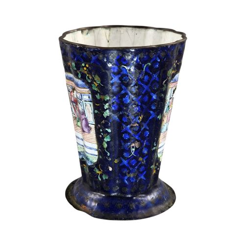 fig 3. A flared cobalt blue Canton enamel copper vessel painted with a central panel depicting Chinese figures in a courtyard setting.