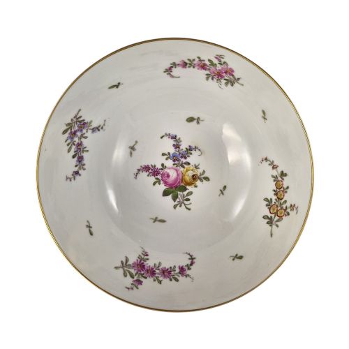 fig 1. A late 19th-century Samson hard-paste porcelain footed bowl featuring a cobalt blue band with gilded leaf details, hand-painted floral cartouches, and a white brick-patterned base.