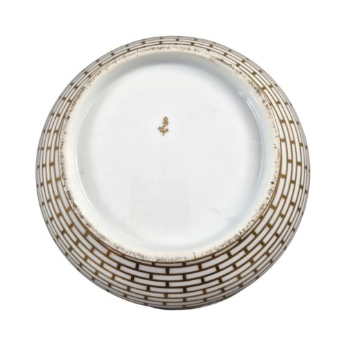 fig 2. A late 19th-century Samson hard-paste porcelain footed bowl featuring a cobalt blue band with gilded leaf details, hand-painted floral cartouches, and a white brick-patterned base.