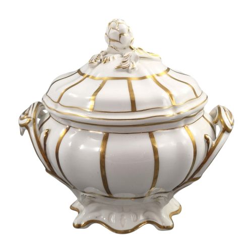 fig 6. A Victorian Davenport bone china sauce tureen with lid and undertray, decorated with white glaze, gilded radial stripes, and an artichoke finial.